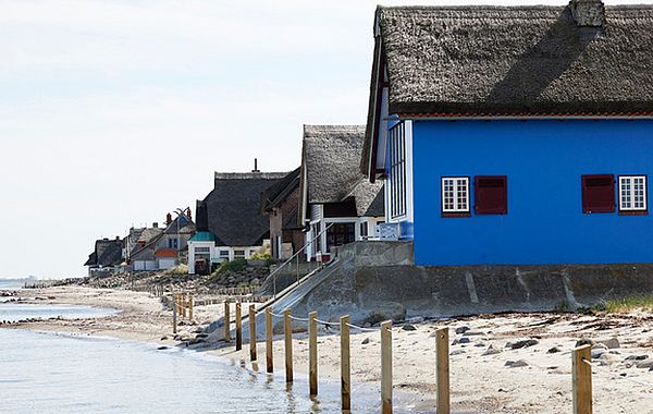 Die bunten Fassaden der Strandhäuser eignen sich beim Fotoshooting gut für den Hintergrund.